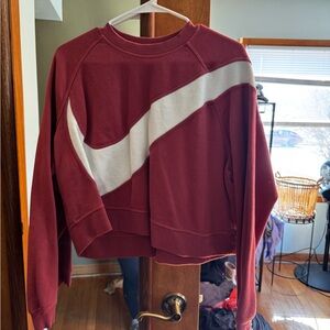 Nike Women's Pink Crewneck Sweatshirt with White Swoosh Accent